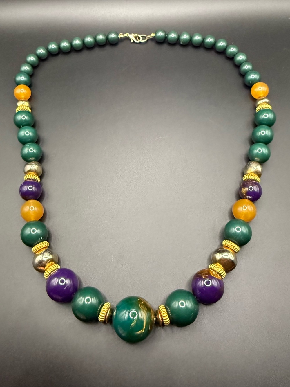 Multi-Bead Graduated Statement Necklace with Green, Gold and Purple Accents